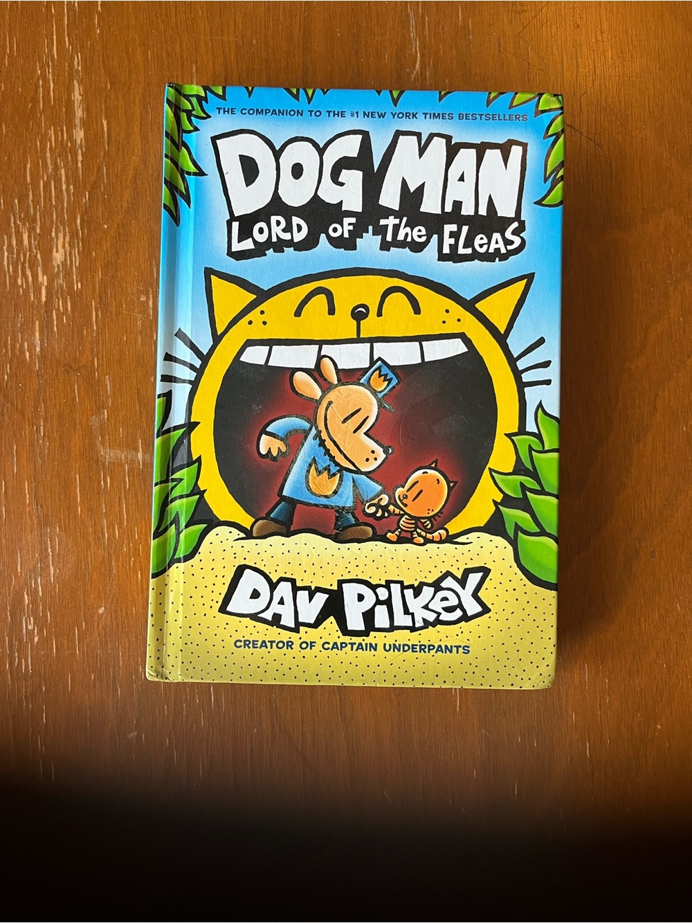 Dog Man: Lord of the Fleas Hardcover Book - Yellow & Blue